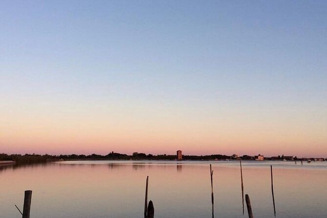 Aperitif at sunset in the Venice lagoon on a private boat. - What to plan for: small boat comfort, sun, and basic prep