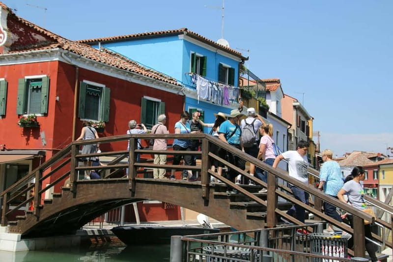 Charm of the Torcello, Burano, and Murano in Venetian Lagoon - Murano free time, glass storefronts, and a guided start