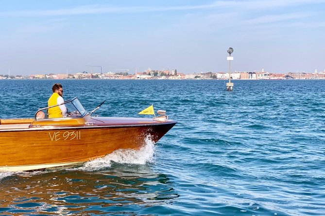Grand Canal and Murano boat tour from Piazzale Roma SHARED TOUR - Piazza San Marco viewpoint time, then out to the lagoon