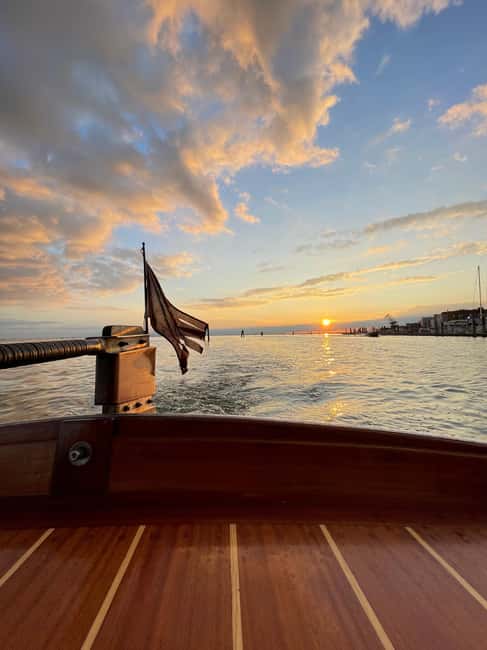 Hop on board an old Venetian boat - St. Mark’s Basin photo stop: San Marco and Doge’s Palace in rare angles