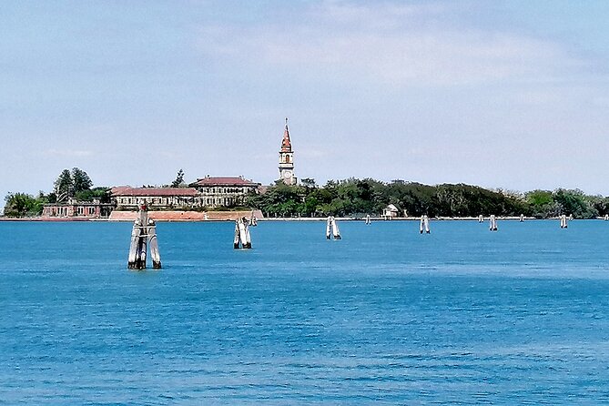 Lido Bike Tour: With a Local on the Island of Cinema - Faro di San Nicolò: where the coastline and old hotel outlines come into view