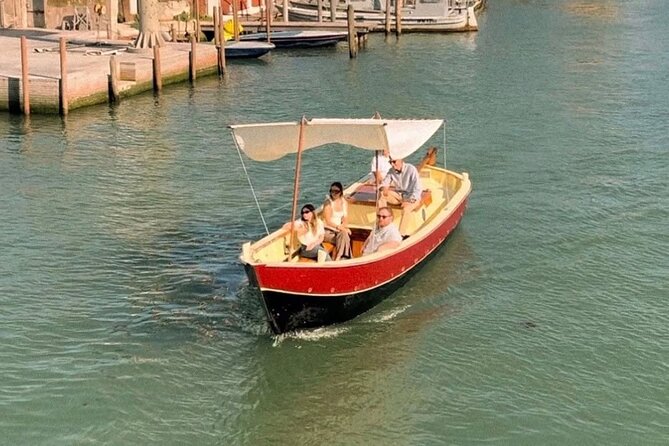 Sunset in a typical boat in Venice - Quick highlights to help you picture the ride