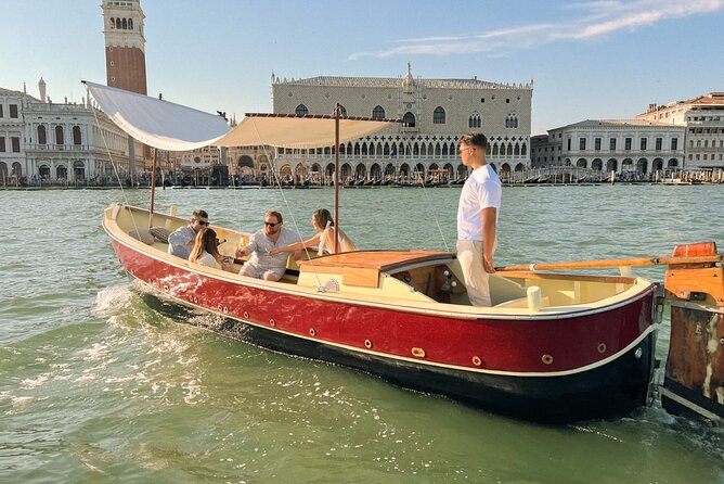 Sunset in a typical boat in Venice - Giudecca from the water: the Venice you feel in your bones