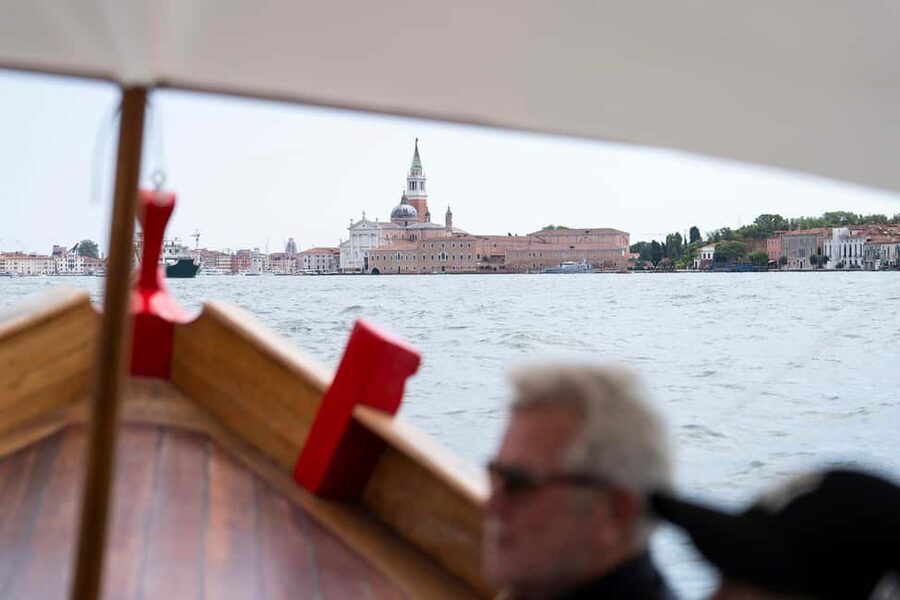Venice at sunset: tour in a historic 1955 bragozzo with an aperitif - Giudecca and the Arsenale basin, plus Lorenzo Quinn’s lagoon-facing art