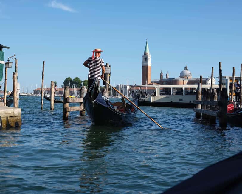 Venice: City Center Walking Tour & Iconic Gondola Ride - Gondola ride logistics: 30 minutes on the water with a short walk gap