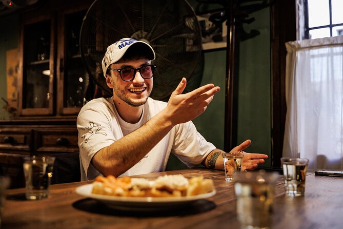 Venice Evening Food Tour: Bites, Drinks & Sit-Down Dinner - Stop 2 on Strada Nova: fish cicchetti and an ombra glass