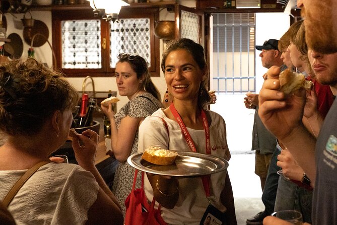 Venice Like a Local: Food, Wine & Spritz Tour with Traghetto Ride - Rialto Bridge, market energy, and a real sense of place