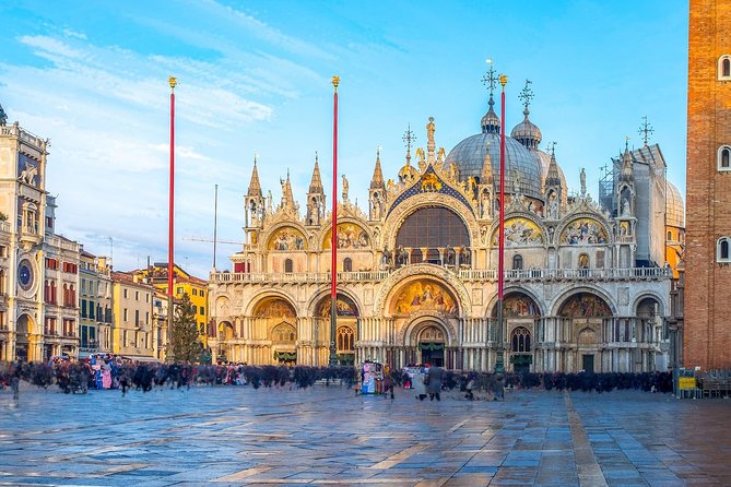 Venice Small Group Walking Tour with St. Mark's Basilica Terrace - Stop 1: Chiesa di San Giacomo di Rialto and the Local Piazza Feel
