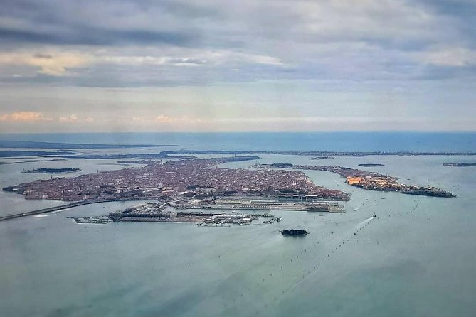 Venice Through a Local’s Eyes: Private Water Taxi & Walking Tour - Seven Centuries on the Water: The Grand Canal Story You Get